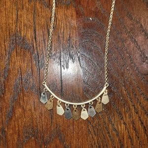 Assorted metal kendra scott necklace.